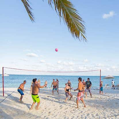Enjoy a game of beach volleyball at Castaway Cay